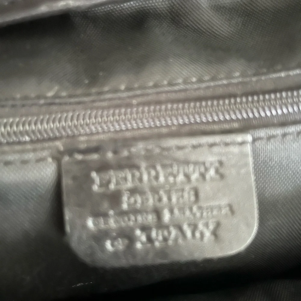 Vintage 70’s Luciano black Italian leather messenger bag.